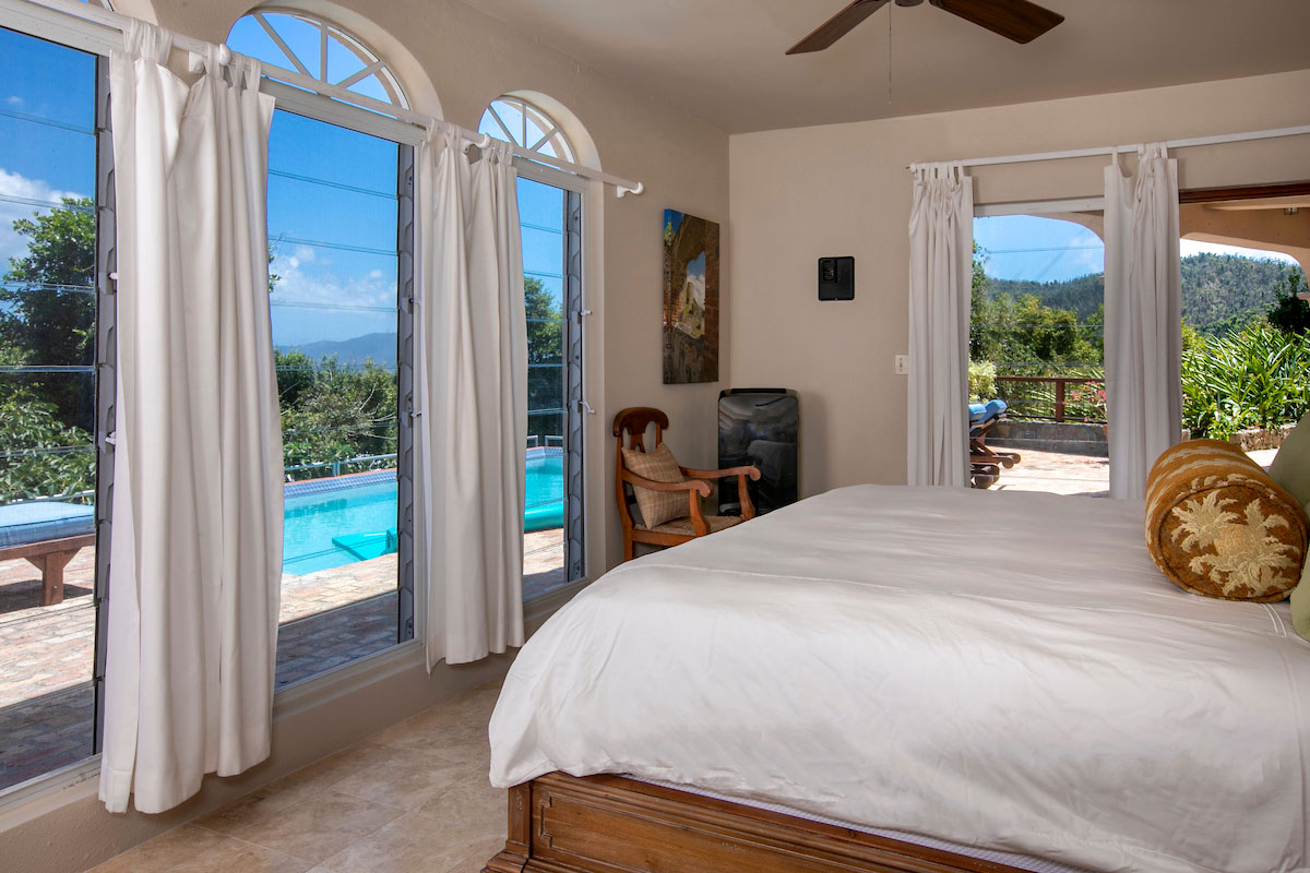 Mango Bay guest bedroom with garden view