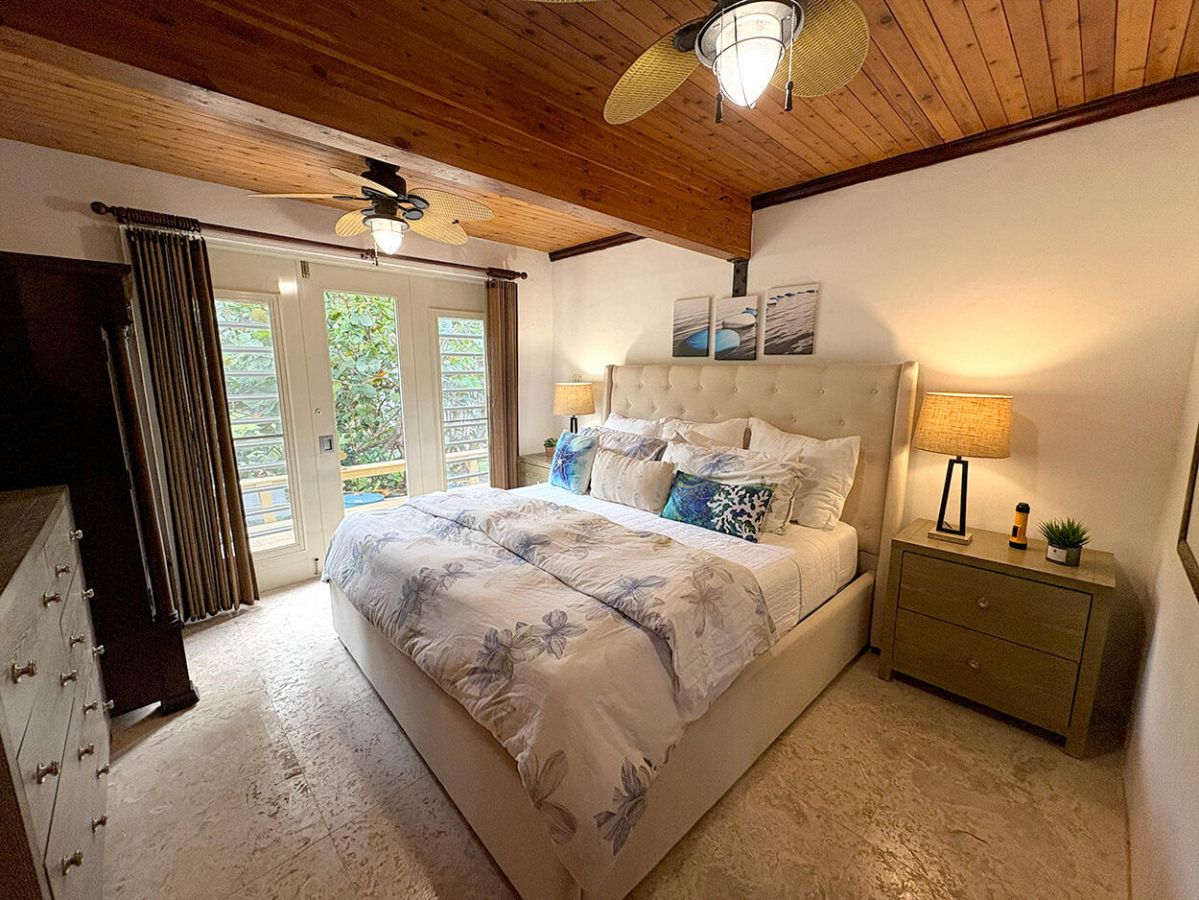Seaside Breeze guest bedroom with garden view
