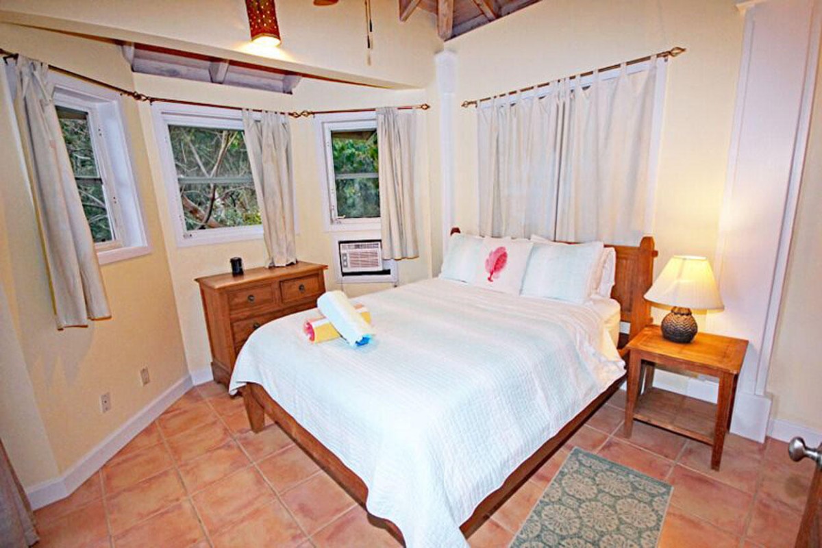 Surfside guest bedroom with garden view